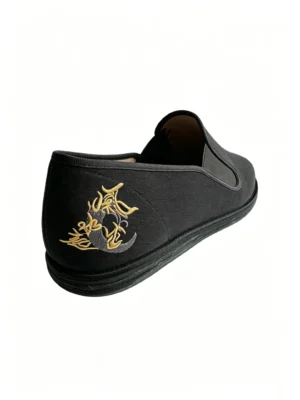 LUNO LN-M4005 men's embroidered mugwort cloth shoe - rear-side view highlighting the intricate gold and black dragon embroidery on the heel, paired with a slip-on design and elastic side panels for easy wear; the minimalist black fabric upper and layered sole reflect traditional craftsmanship blended with modern comfort for everyday use.