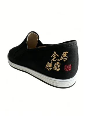 LUNO LN-M4021 men's traditional Chinese cloth shoes rear-side view - featuring a classic black slip-on upper with golden embroidered Chinese characters and a red seal stamp on the heel, paired with a clean white layered rubber sole; the design blends heritage aesthetics with modern comfort for casual daily wear.