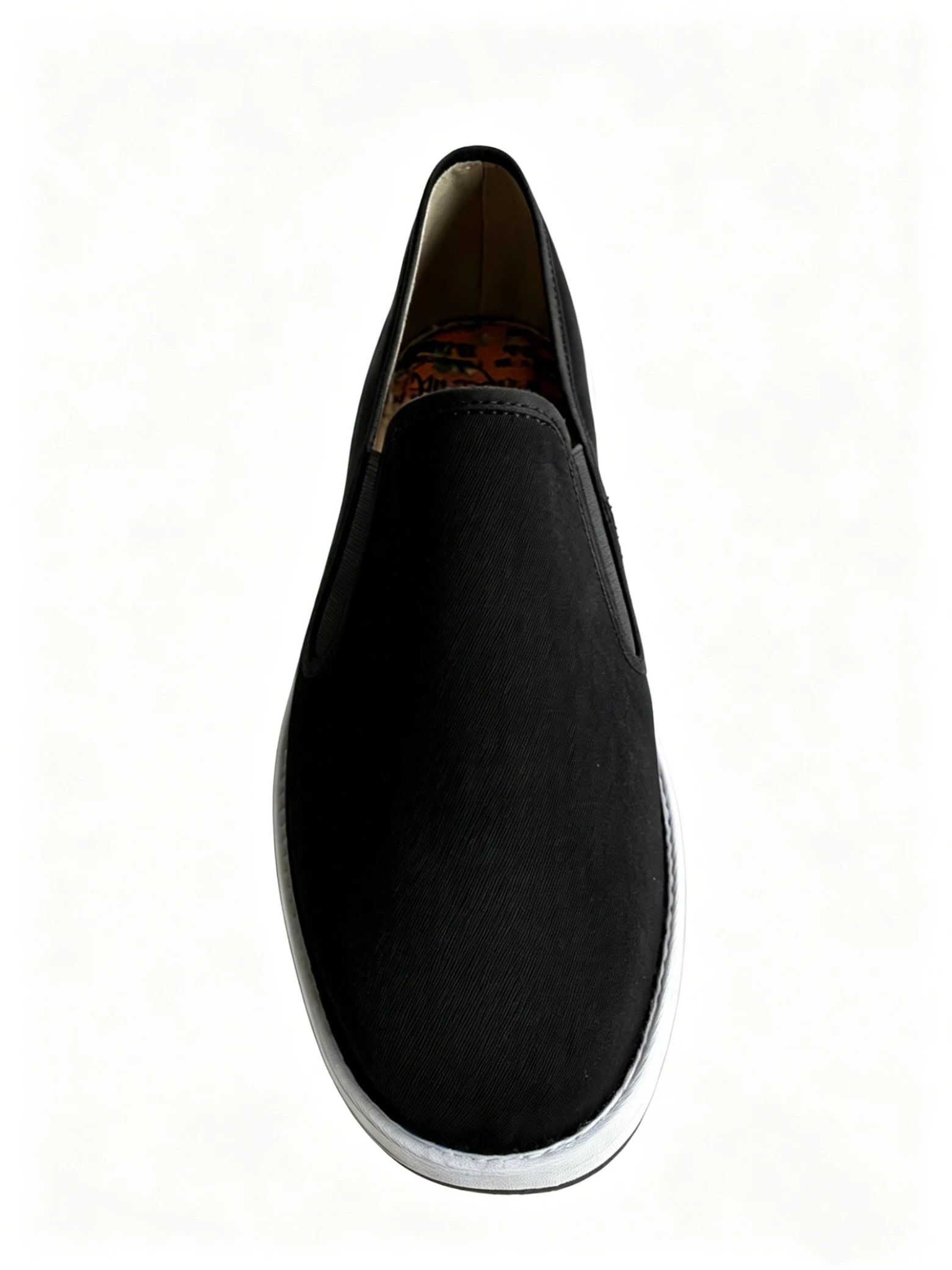 luno ln m4026 traditional chinese cloth shoes massage insole LUNO LN-M4026 traditional Chinese cloth shoes top-down view - featuring a sleek black canvas upper with elastic side panels for easy slip-on wear, and a white layered rubber sole; the interior reveals a distinctive massage insole printed with Traditional Chinese Medicine (TCM) characters and herbal patterns, designed to provide acupressure stimulation and promote foot health.