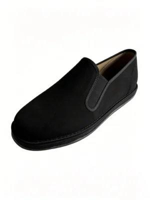LUNO LN-M4028 traditional Chinese cloth shoes angled side view - featuring a sleek black canvas upper with elastic side panels for easy slip-on wear, and a layered rubber sole designed for comfort and durability.