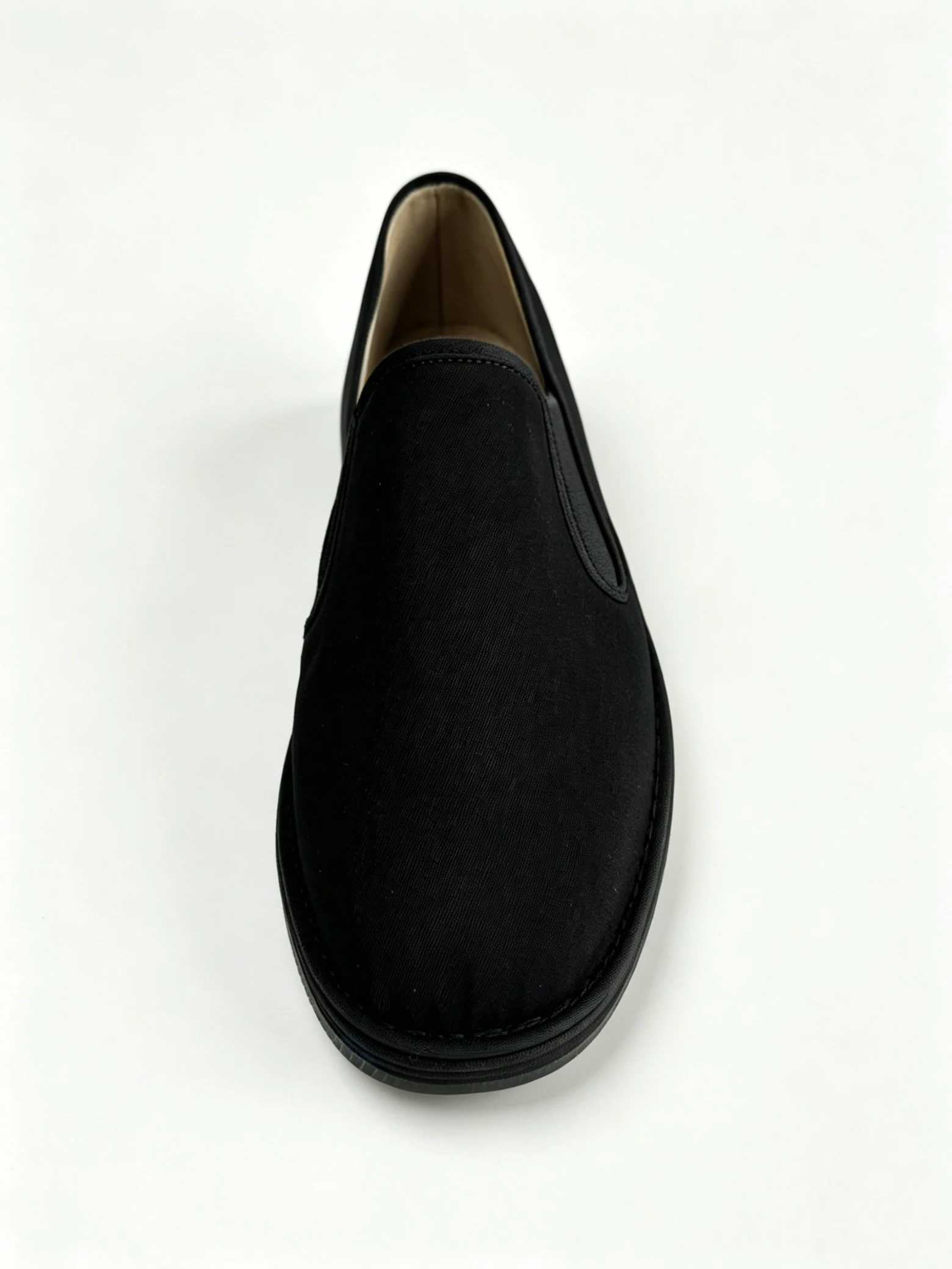 luno ln m4029 traditional chinese cloth shoes embroidered insole LUNO LN-M4029 traditional Chinese cloth shoes top-down view - featuring a sleek black canvas upper with elastic side panels for easy slip-on wear, and a beige insole visible at the opening, highlighting its minimalist design and comfort-focused construction.