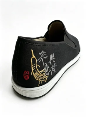 LUNO LN-M4030 traditional Chinese cloth shoes rear-side view - featuring a black canvas upper with detailed gold ginseng root embroidery and Chinese calligraphy on the heel, paired with a white rubber sole.
