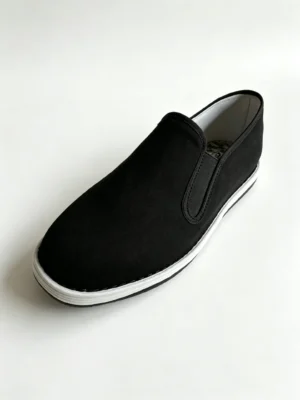 LUNO LN-M4031 traditional Chinese cloth shoes side view - black canvas upper with white rubber sole, featuring a slip-on design and therapy insole for enhanced comfort and foot support.