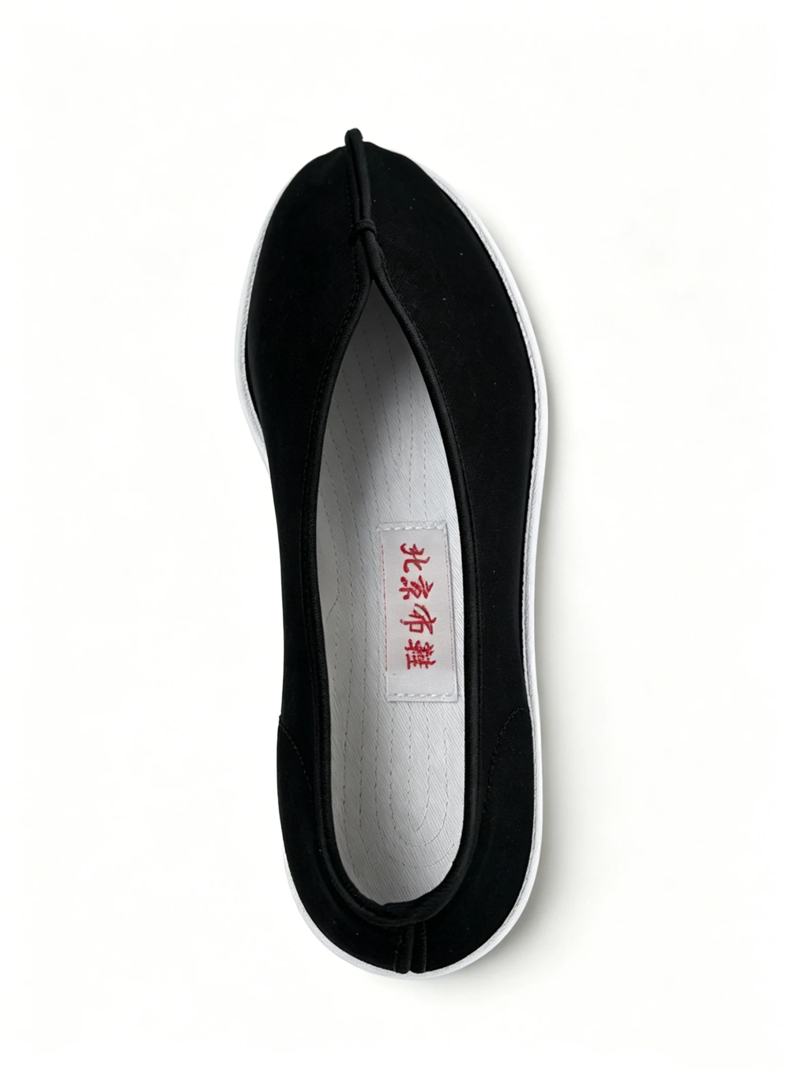luno ln m5025 traditional chinese cloth shoes yellow ox tendon outsole LUNO LN-M5025 traditional Chinese cloth shoes top-down view - featuring a sleek black canvas upper with elastic side panels for easy slip-on wear, and a white layered rubber sole; the interior reveals a distinctive massage insole printed with Traditional Chinese Medicine (TCM) characters and herbal patterns, designed to provide acupressure stimulation and promote foot health.